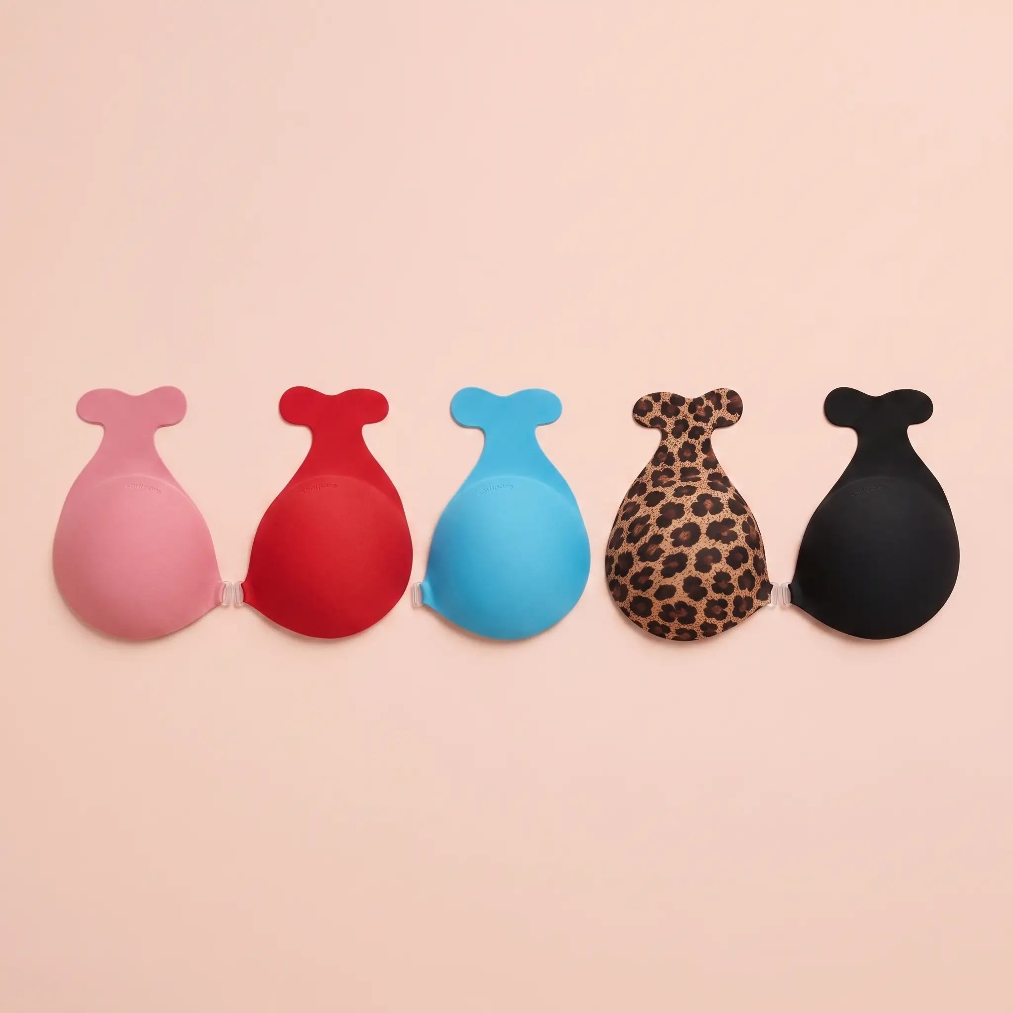 The Statement Bra in Blush, Scarlet, Indigo, Leopard and Onyx, side by side