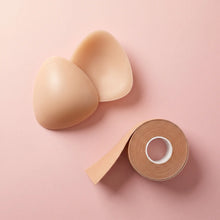 The Starter Duo flat lay - a pair of nude Sculpt inserts and a roll of nude body tape