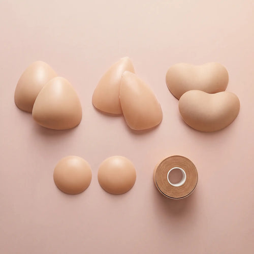 The Complete Kit flat lay - the Sculpt, the Sculpt Lite, the Sweetheart, round covers and body tape